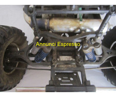 AUTO  A SCOPPIO TELECOMANDATA 4 WD TRUCK-MOSTER XT