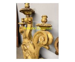 Antica coppia di grandi applique in legno dorato