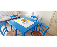 Tavolo allungabile  + 4  sedie