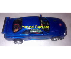 Modellino Mini-racer Nissan Skyline gt-r scala1:32