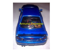 Modellino Mini-racer Nissan Skyline gt-r scala1:32