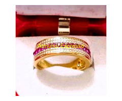 ANELLO / FASCIA IN ARGENTO CON RUBINI