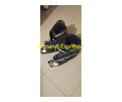 Scarponi da sci e tuta da sci donna