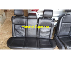 Sedili e pannelli in pelle nera+ cerchi in lega