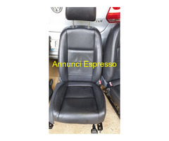 Sedili e pannelli in pelle nera+ cerchi in lega