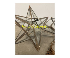 Antica lampada a stella in ferro battuto e vetri