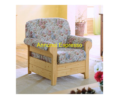 Poltrona con struttura legno e stoffa floreale