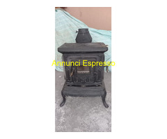 Stufa putage nera in ghisa in ottime condizioni