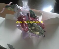 BAMBOLA DI PORCELLANA CON CARILLON