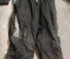 Scarponi da sci e tuta da sci donna