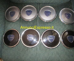 Borchie-copri mozzo x cerchi LEGA , LANCIA YPSILON